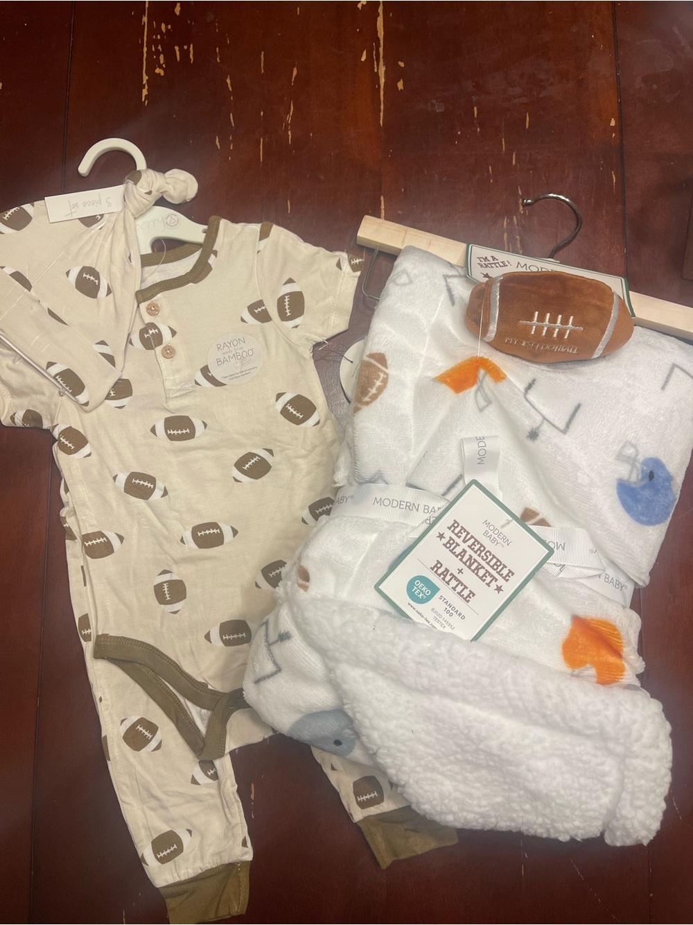 Football Baby Bundle: Blanket with football rattle and 3 pc Rayon Football Set.